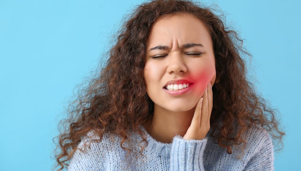 Female with sever tooth pain